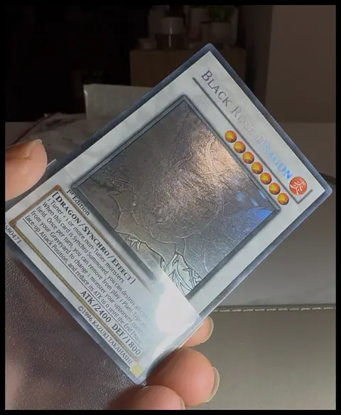 Black Rose Dragon card, TCGAI Score 8.0
